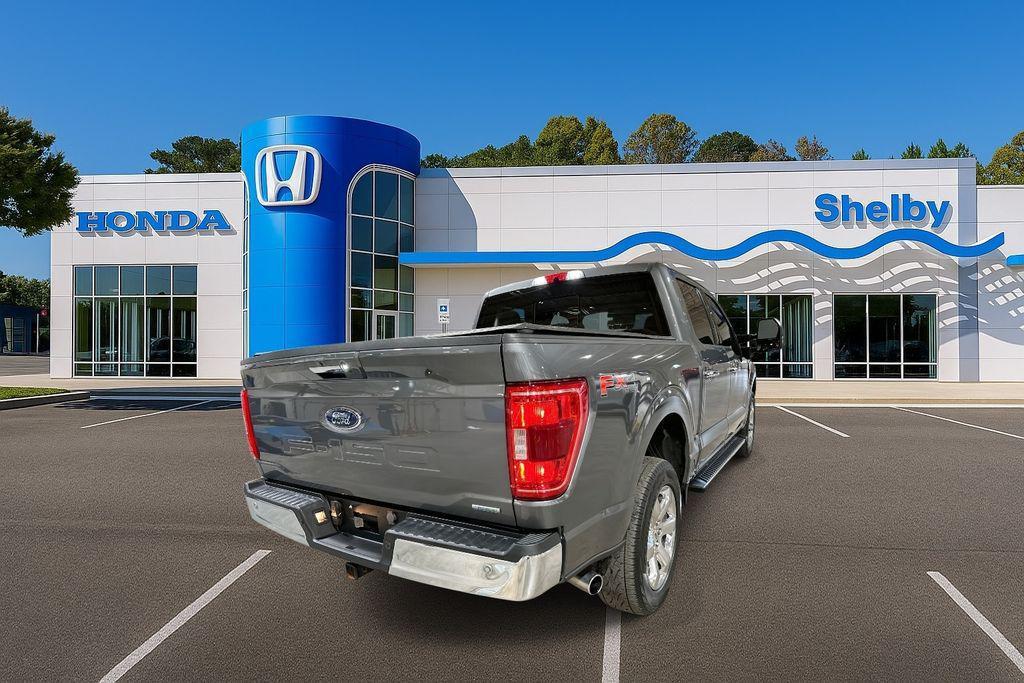 used 2023 Ford F-150 car, priced at $38,811