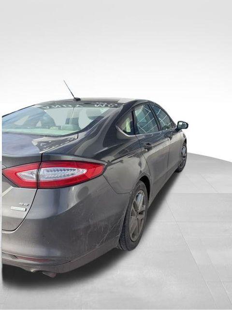 used 2016 Ford Fusion car, priced at $2,500