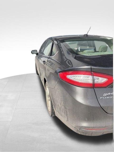 used 2016 Ford Fusion car, priced at $2,500