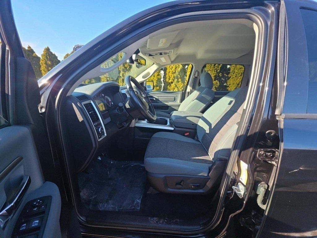 used 2018 Ram 1500 car, priced at $25,339