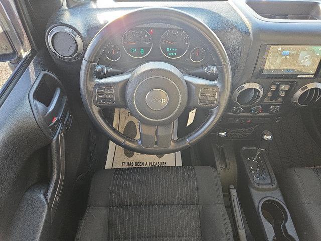 used 2012 Jeep Wrangler Unlimited car, priced at $13,999