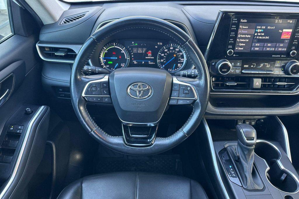 used 2020 Toyota Highlander Hybrid car, priced at $29,495