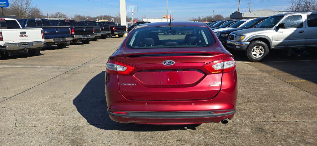 used 2014 Ford Fusion car, priced at $5,880