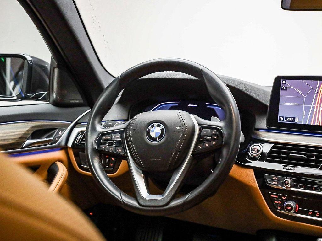 used 2023 BMW 530e car, priced at $36,891