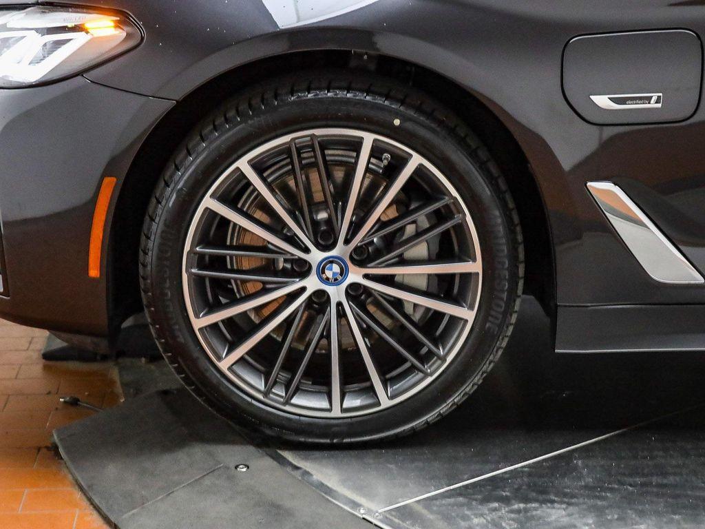 used 2023 BMW 530e car, priced at $36,891