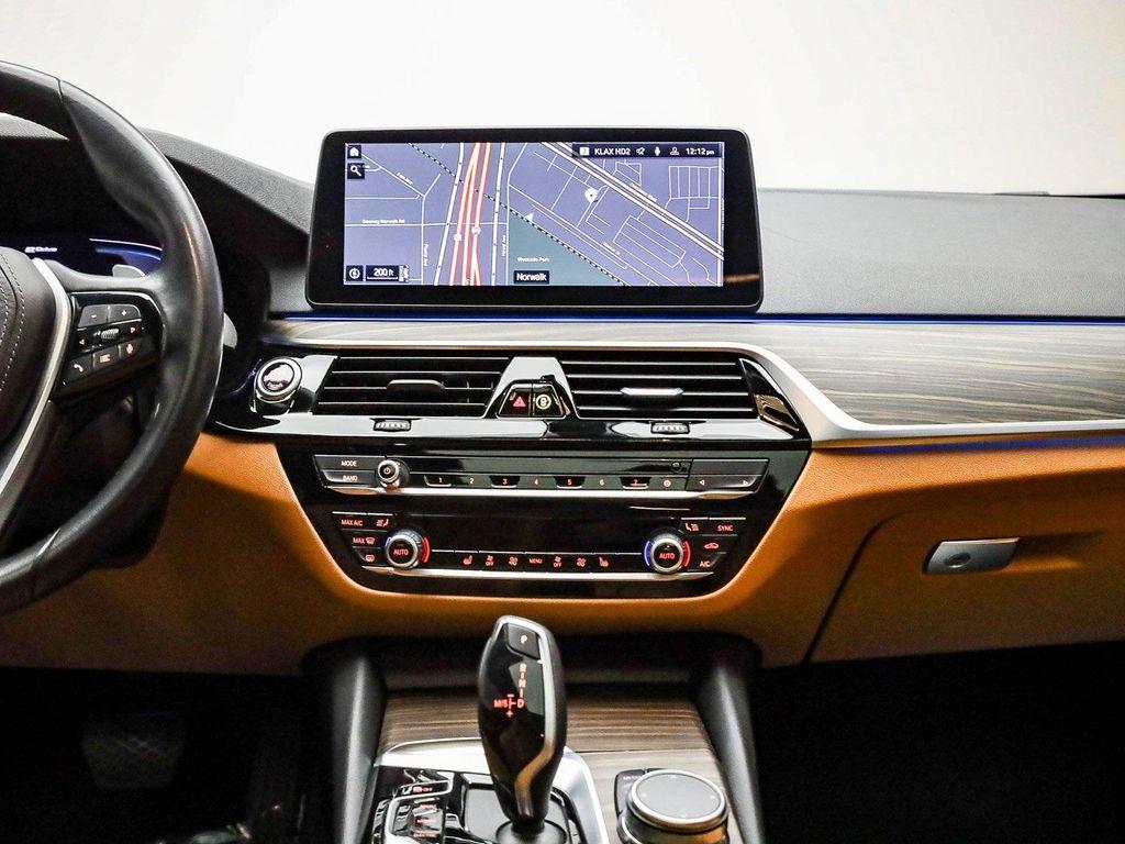 used 2023 BMW 530e car, priced at $36,891