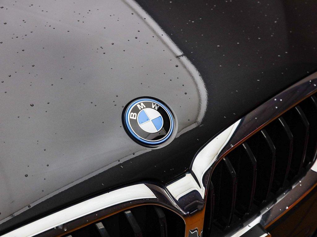 used 2023 BMW 530e car, priced at $36,891