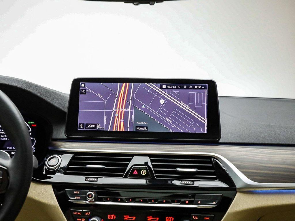 used 2023 BMW 530e car, priced at $36,391