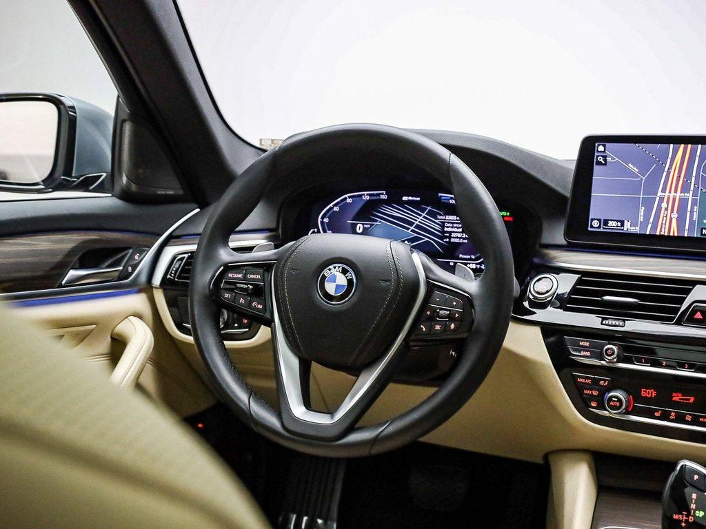 used 2023 BMW 530e car, priced at $36,391