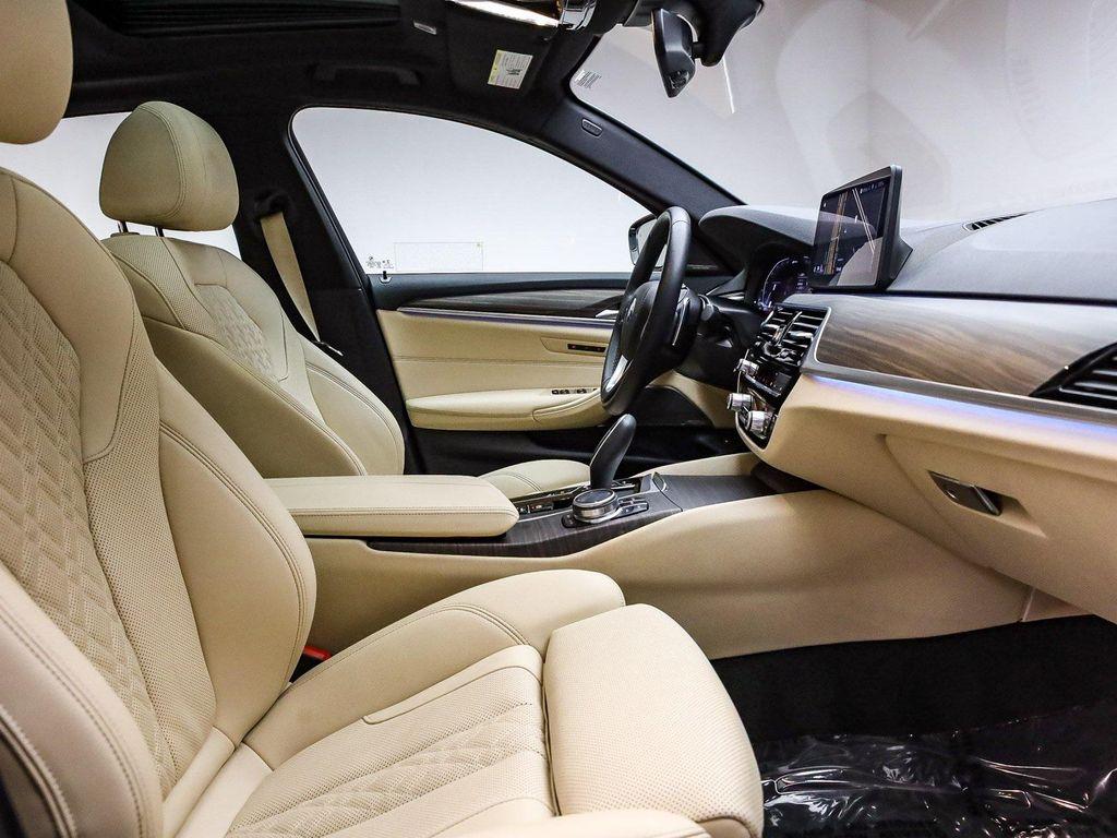 used 2023 BMW 530e car, priced at $36,391