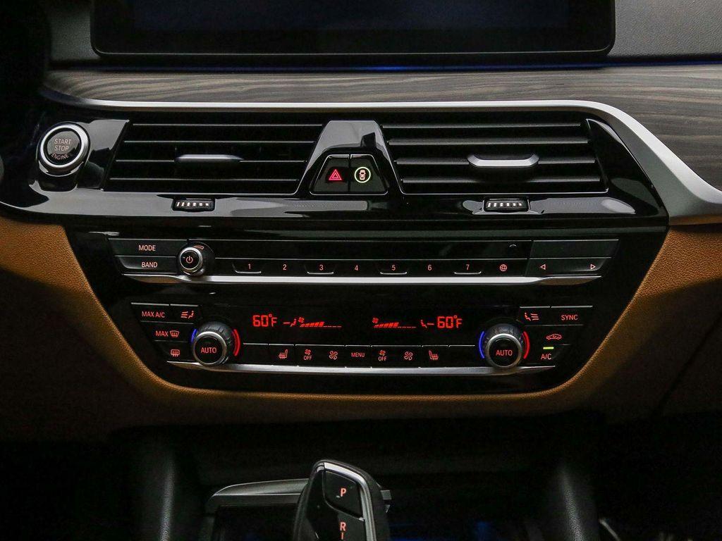 used 2023 BMW 530e car, priced at $34,992