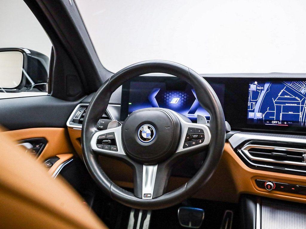 used 2023 BMW 330e car, priced at $30,991