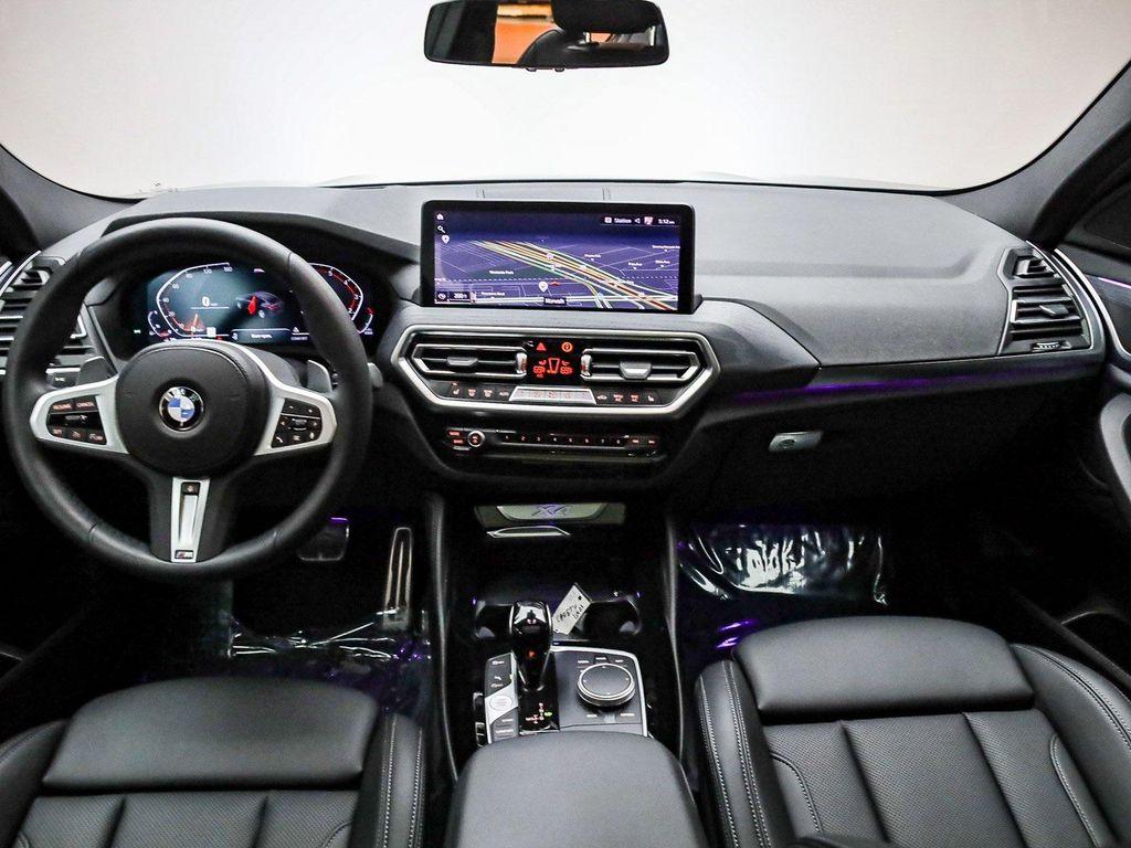 used 2025 BMW X4 car, priced at $50,991
