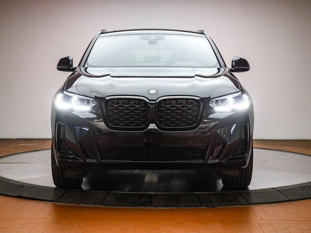 used 2025 BMW X4 car, priced at $50,991