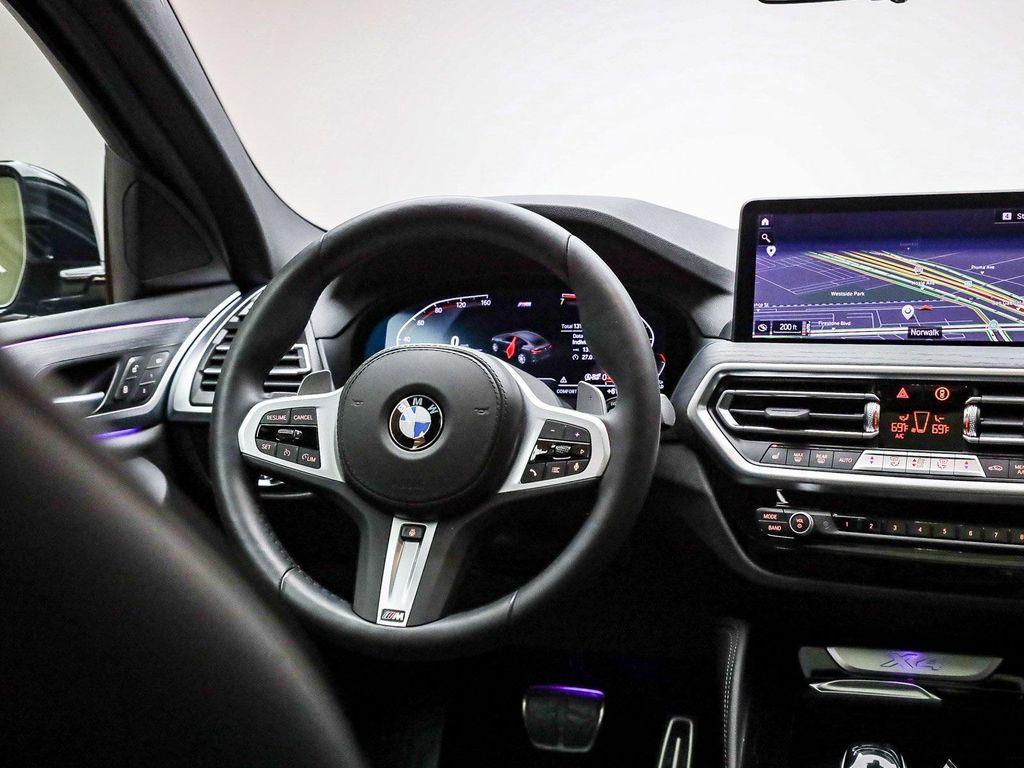 used 2025 BMW X4 car, priced at $50,991