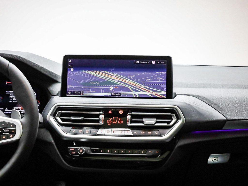 used 2025 BMW X4 car, priced at $50,991