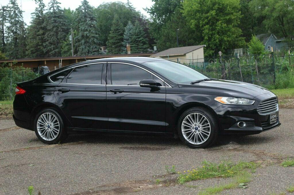 used 2016 Ford Fusion car, priced at $14,970