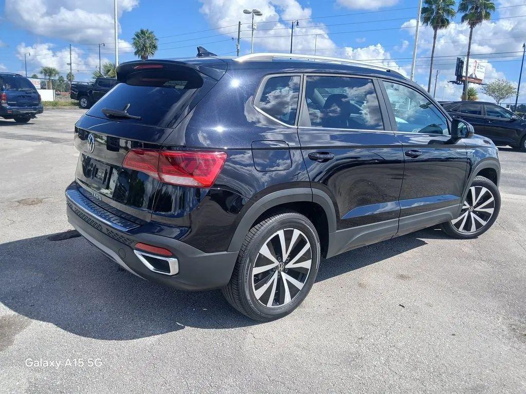 used 2023 Volkswagen Taos car, priced at $14,202