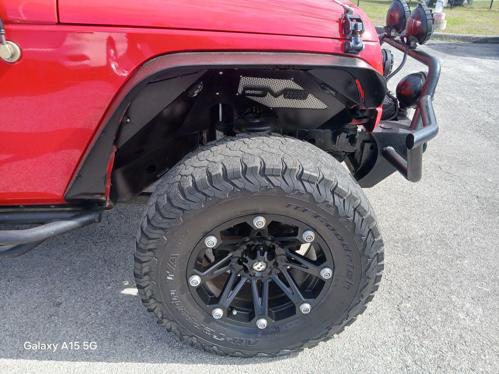 used 2015 Jeep Wrangler Unlimited car, priced at $13,026