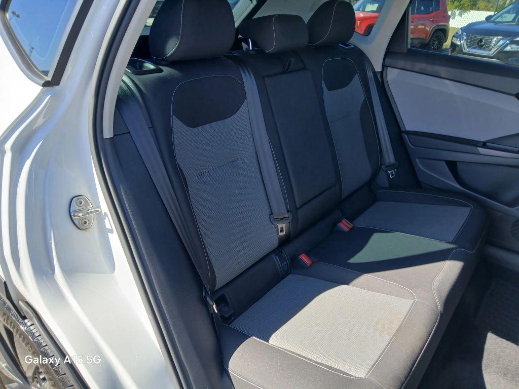 used 2023 Volkswagen Taos car, priced at $14,500