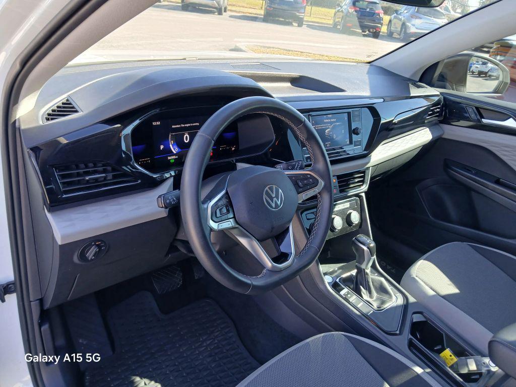 used 2023 Volkswagen Taos car, priced at $14,500