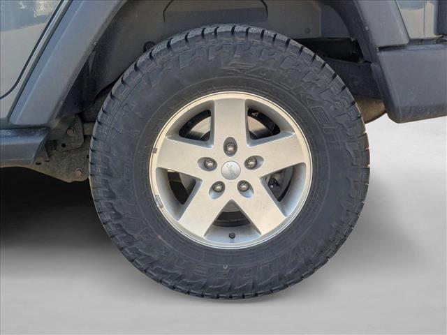 used 2014 Jeep Wrangler Unlimited car, priced at $13,490