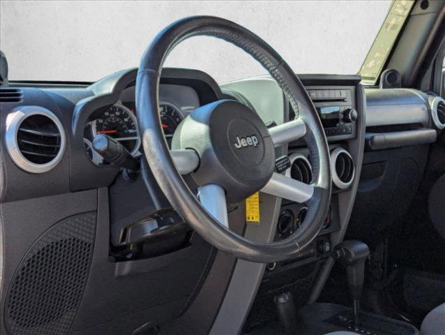 used 2009 Jeep Wrangler Unlimited car, priced at $10,250