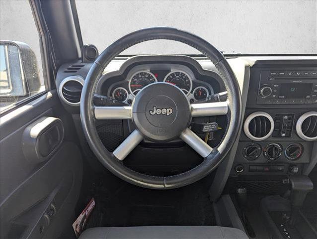 used 2009 Jeep Wrangler Unlimited car, priced at $10,250