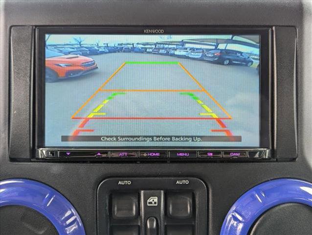 used 2014 Jeep Wrangler Unlimited car, priced at $18,490