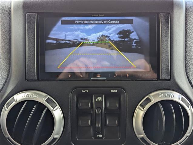 used 2016 Jeep Wrangler Unlimited car, priced at $26,199