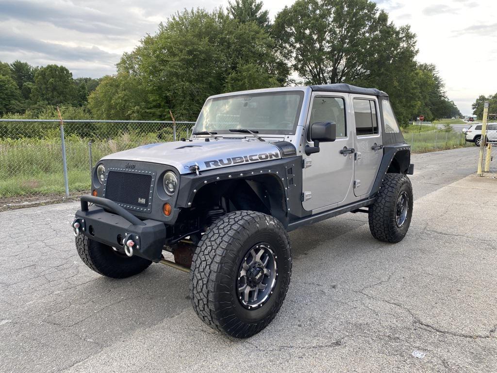 used 2013 Jeep Wrangler Unlimited car, priced at $20,587