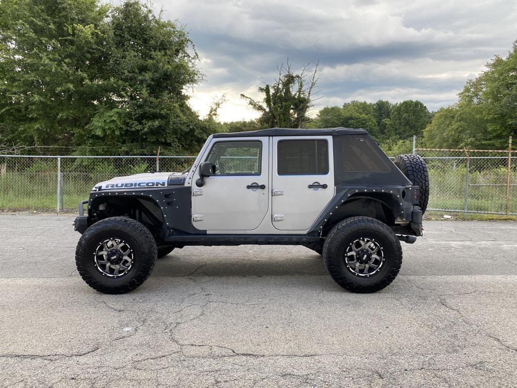 used 2013 Jeep Wrangler Unlimited car, priced at $20,587
