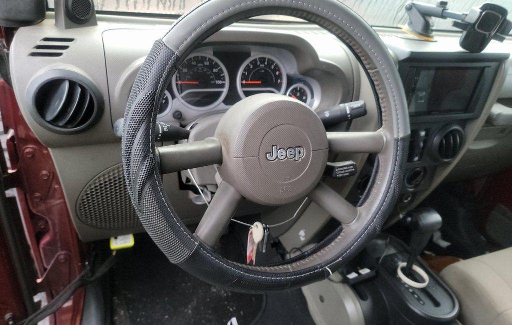 used 2010 Jeep Wrangler Unlimited car, priced at $10,798