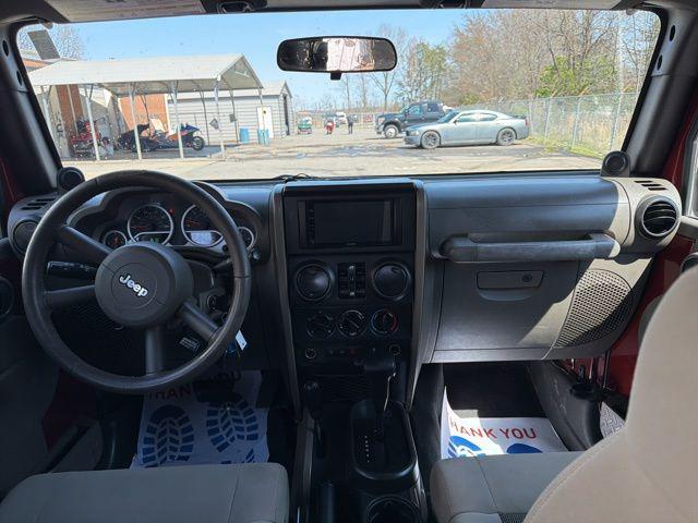 used 2010 Jeep Wrangler Unlimited car, priced at $10,584