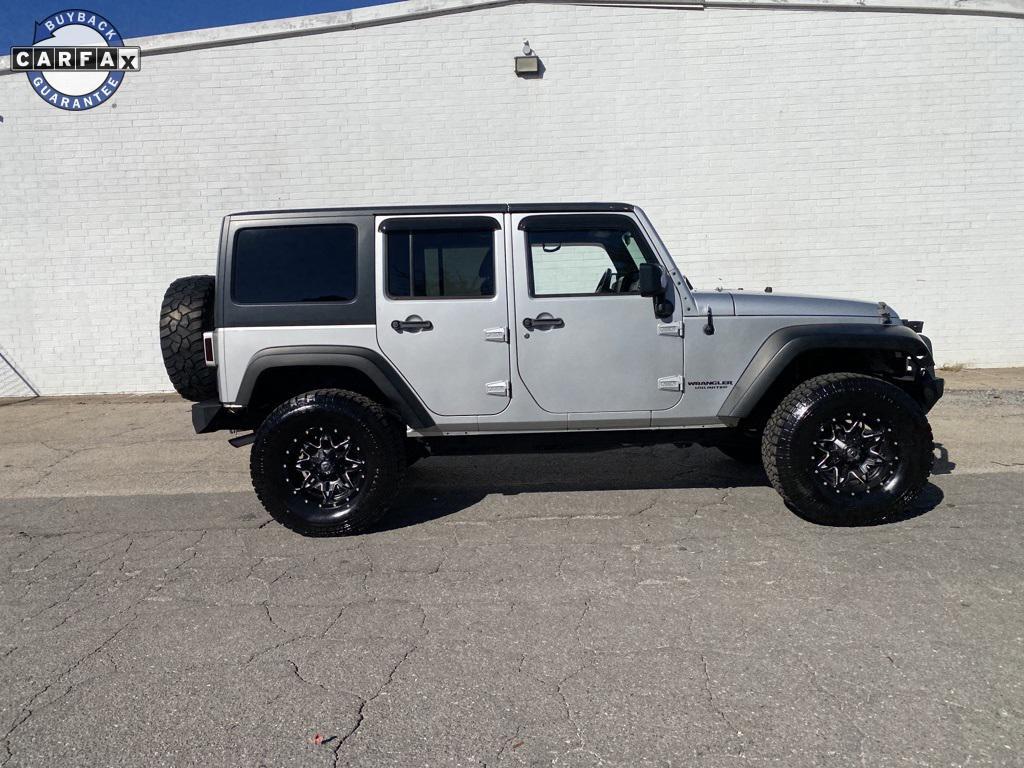 used 2011 Jeep Wrangler Unlimited car, priced at $12,998