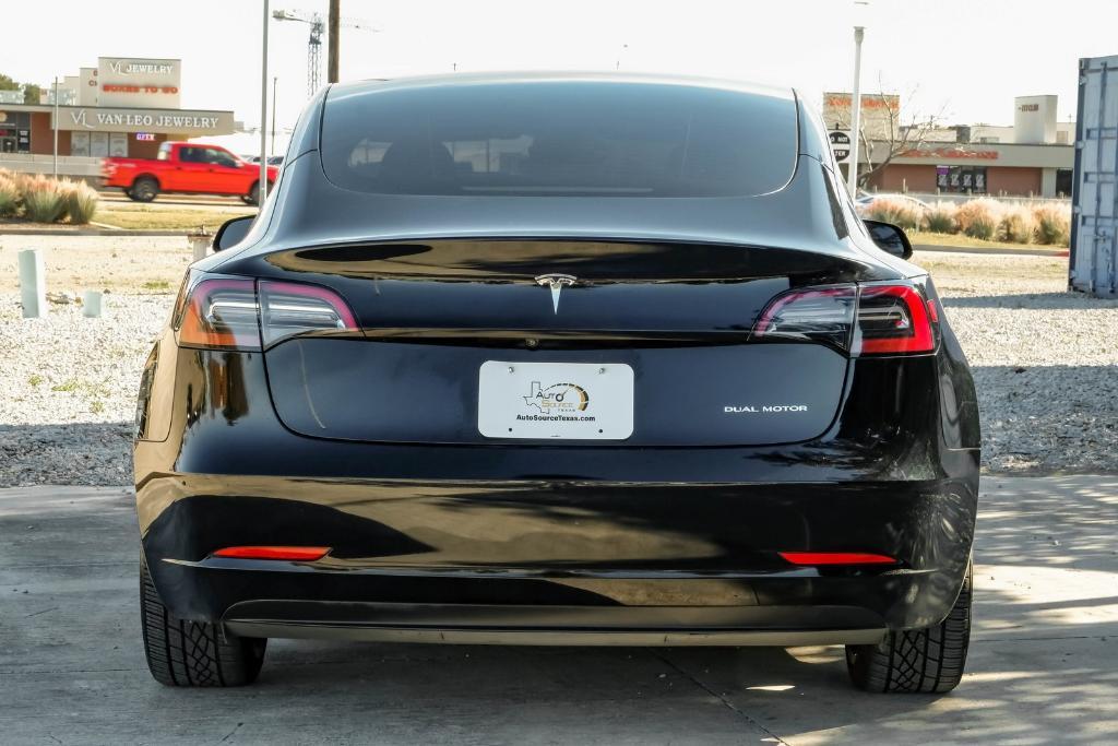 used 2023 Tesla Model 3 car, priced at $25,999