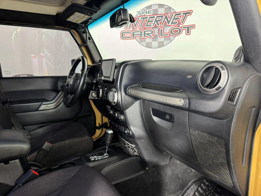 used 2014 Jeep Wrangler Unlimited car, priced at $12,994