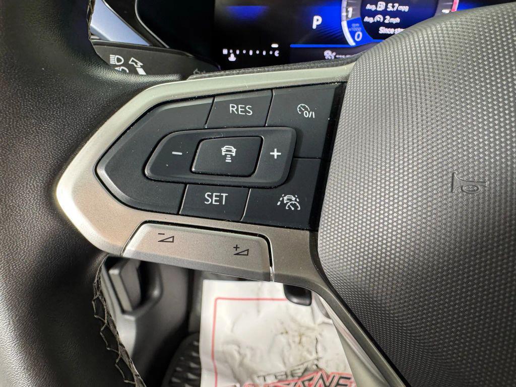 used 2024 Volkswagen Taos car, priced at $21,999