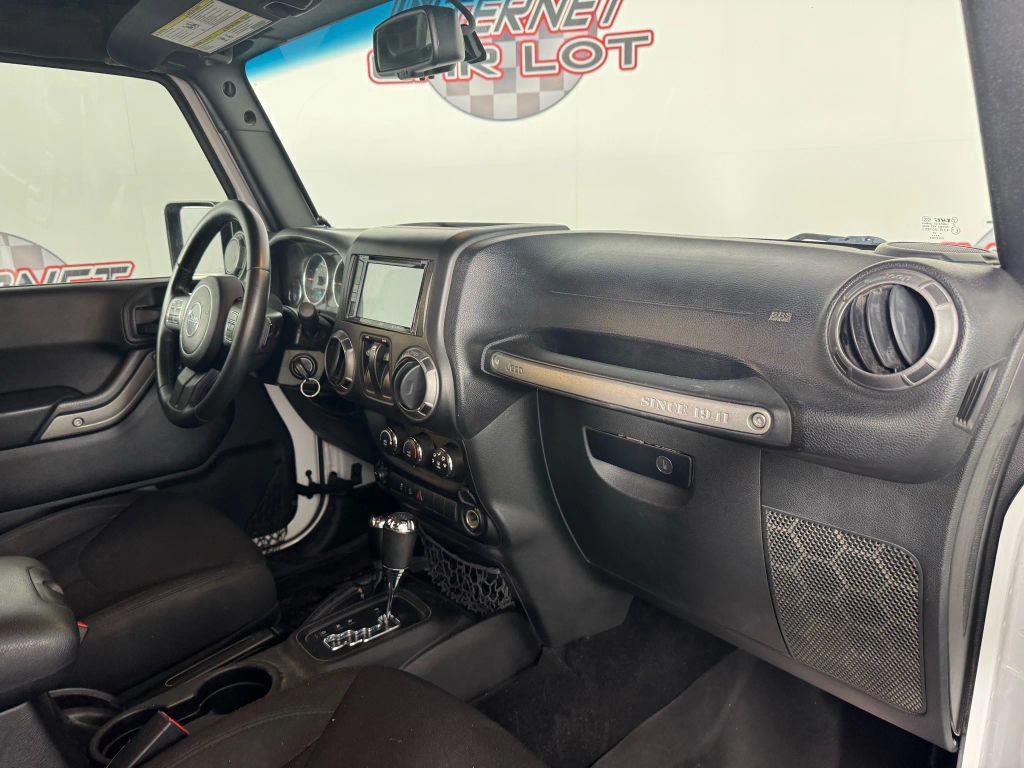 used 2015 Jeep Wrangler car, priced at $13,994