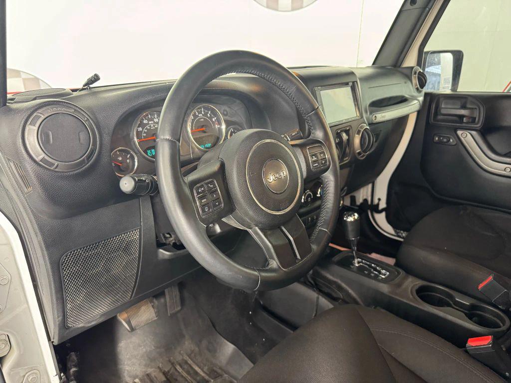 used 2015 Jeep Wrangler car, priced at $13,994