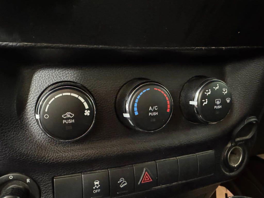 used 2015 Jeep Wrangler car, priced at $13,994