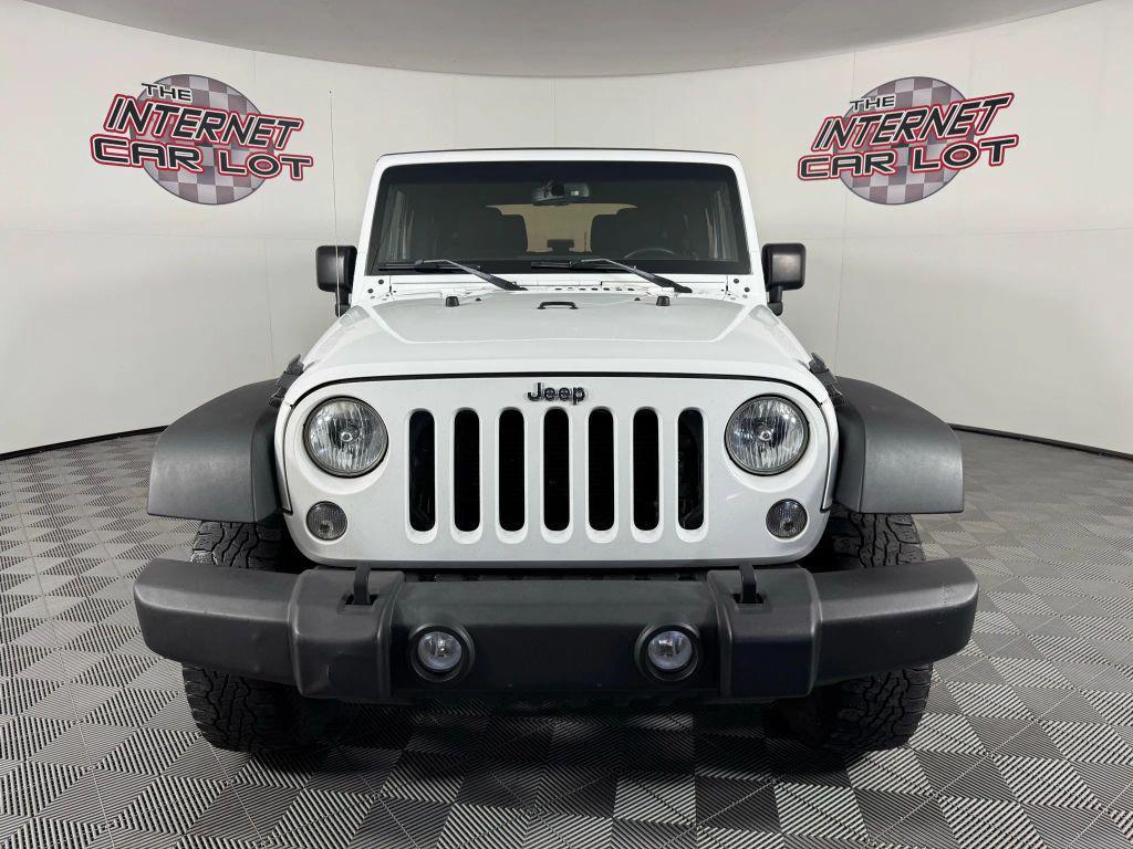 used 2015 Jeep Wrangler car, priced at $13,994