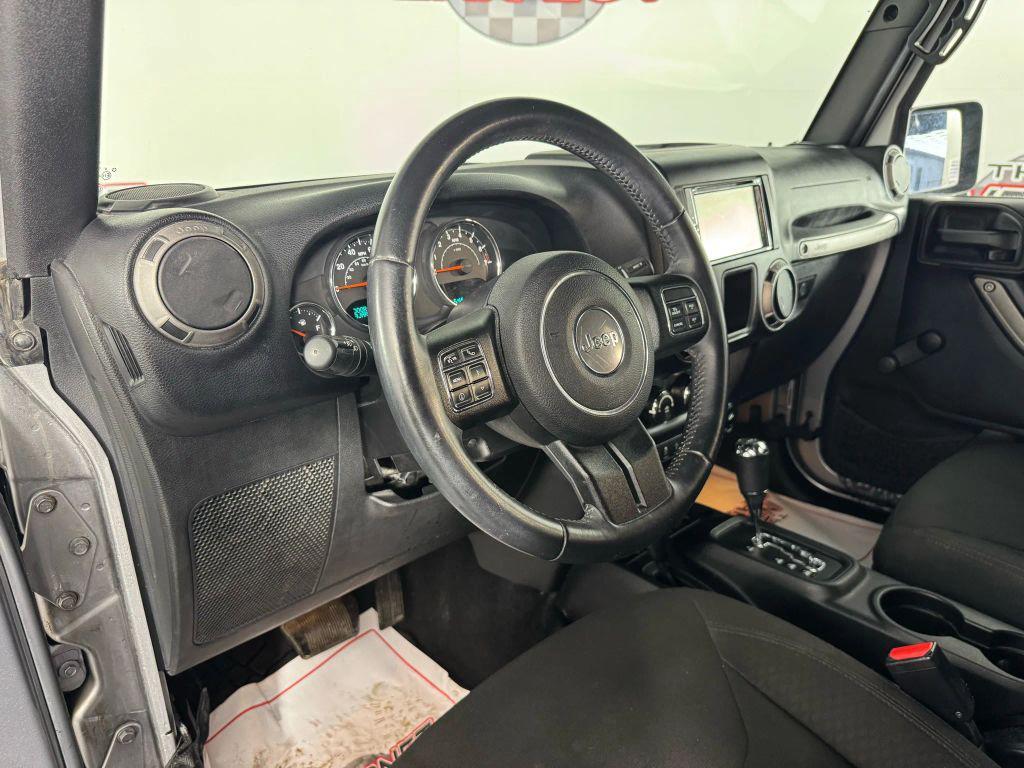 used 2015 Jeep Wrangler car, priced at $16,495
