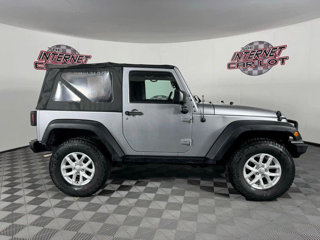 used 2015 Jeep Wrangler car, priced at $16,495