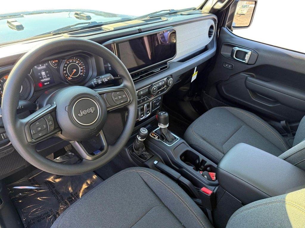 used 2026 Jeep Wrangler car, priced at $35,479