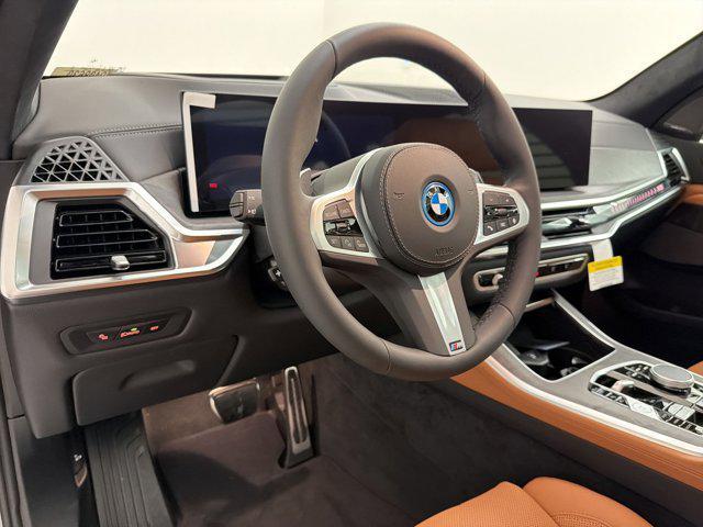 new 2026 BMW X5 PHEV car, priced at $91,375