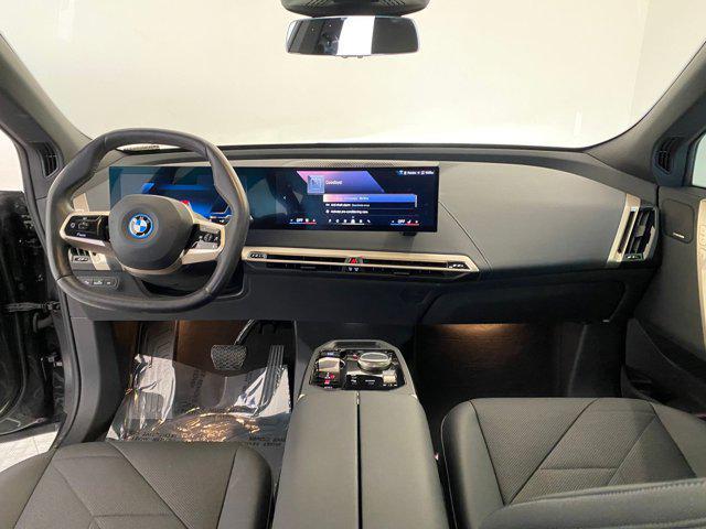 used 2024 BMW iX car, priced at $49,598