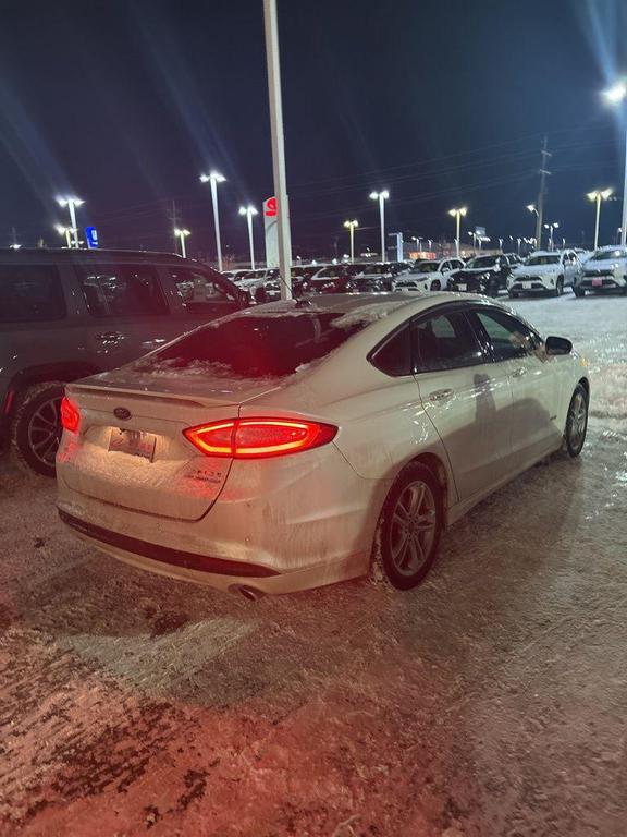 used 2016 Ford Fusion Energi car, priced at $6,900