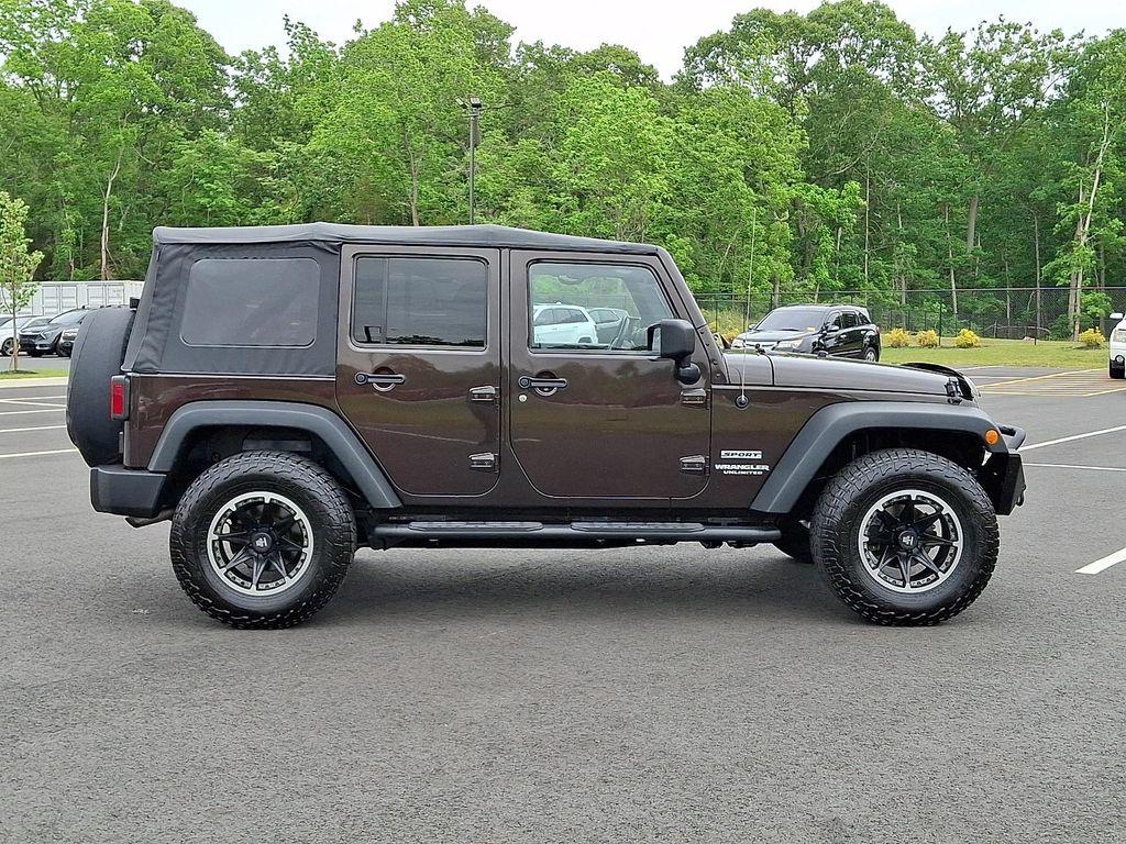 used 2013 Jeep Wrangler Unlimited car, priced at $17,698