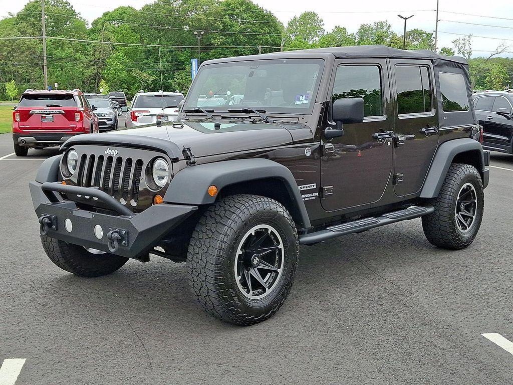 used 2013 Jeep Wrangler Unlimited car, priced at $17,698